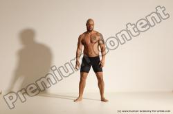 Underwear Gymnastic poses Man Black Muscular Bald Dancing Dynamic poses Academic